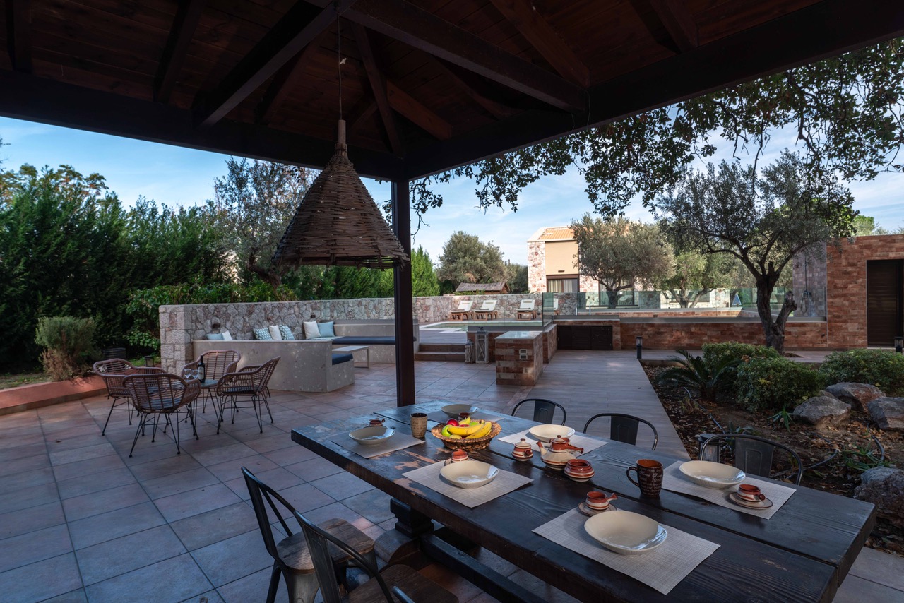 BBQ and seating area by the pool