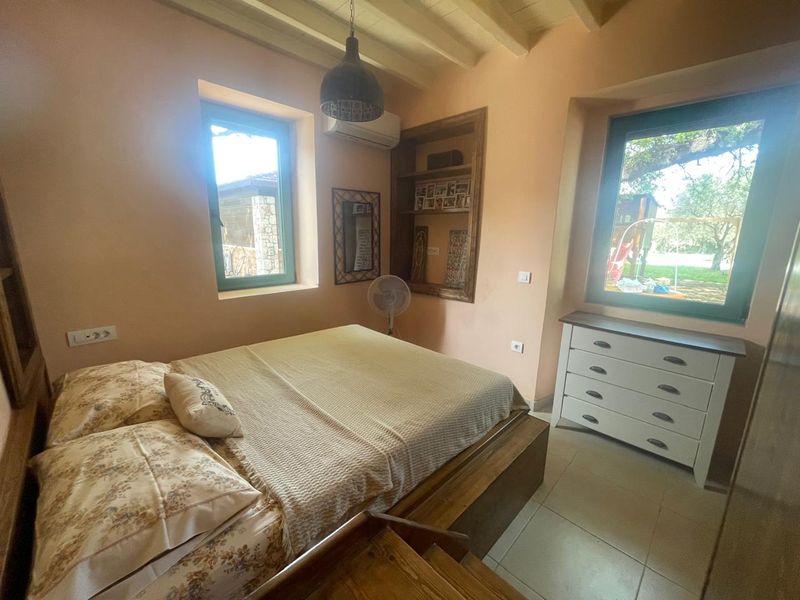 Bedroom 1 in the traditional Pirgos guesthouse from 1917 at Villa Irianna, Rhodes